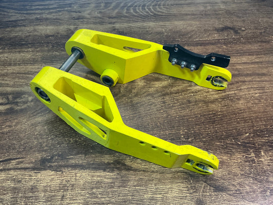 SECOND HAND - YELLOW REAR SWING ARM FOR DRAGON RAPTOR
